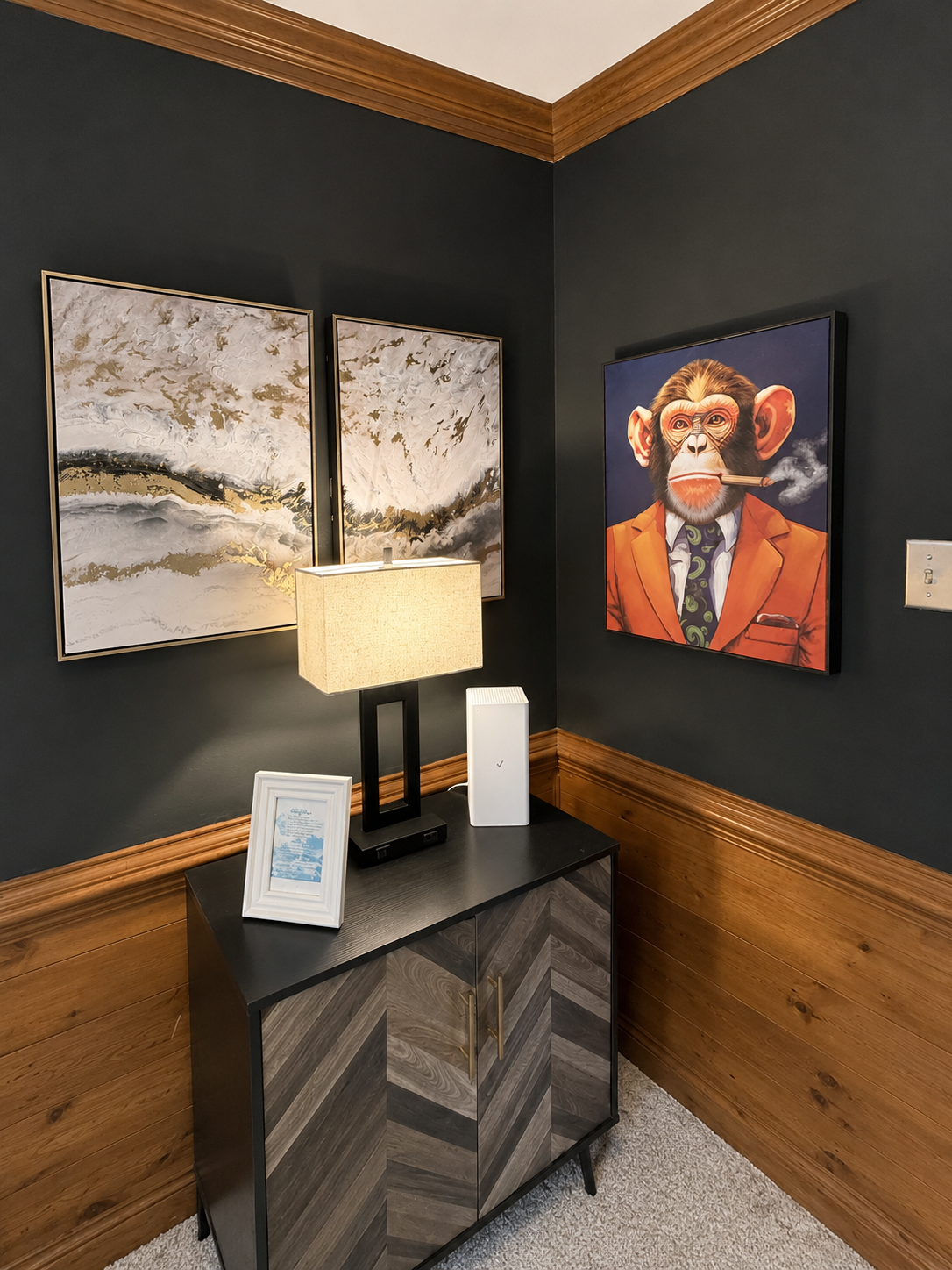 A cozy interior corner with artwork and warm lighting at Serenity Co-Living Residence